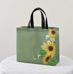 Custom Logo PP Non Woven Heavy Duty Recyclable Tote Bag with Shoulder Handle for Children’s Clothing Gift Packaging