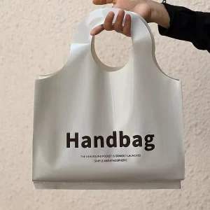 Custom Logo Plastic Merchandise Bags with Punch Handles Garment Cover Bags Clothing Packaging