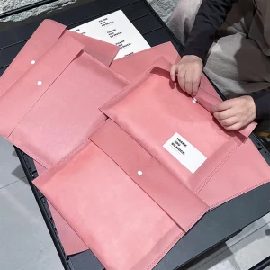Custom Logo Print Sustainable Brand Packaging Non woven Fabric Envelope T Shirt Bags with Snap Button Closure