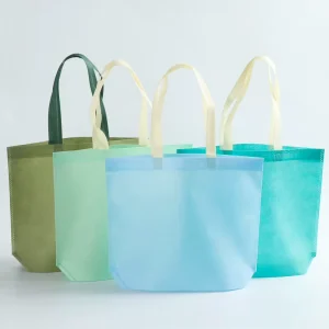 Eco friendly Letter Pattern Colorful Custom Printed Logo Non Woven Shopping Tote Bags with Custom Sizes for Promotion