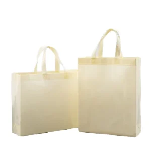 Gentle Neutral Pick Light Beige Soft Fabric Straps Recyclable Lightweight Non Woven Bags for Fashion Boutiques Packaging