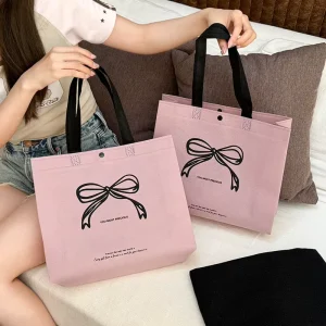 High End Reusable Non Woven Fabric Bows Handbag Elegant Logo Clothing Store Shopping Packaging Bag Good Appearance