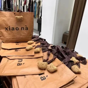 High Quality Recyclable Reusable Premium Woven Bag Laminated Waterproof With Handle Clothing Store Gift Packaging Bag