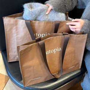 Large Capacity Polypropylene Woven Bag for Clothing Stores Women’s Clothing Packaging Shopping Bag Handle Custom Gray Gift Bag