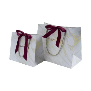 Custom High end Luxury Durable 230gsm Matted Paper Gift Shopping Bag with Rope Handle and Die Cut for Bow tie Decor
