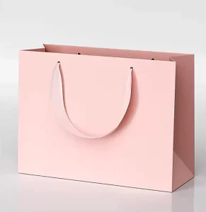 Custom Personalized Printed Black Luxury Laminated Gift Clothing Dresses Retail Shopping Paper Bag With Ribbon Handle
