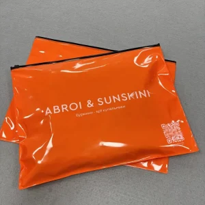 Custom Printed Premium Packaging Zipper Bag For Cosmetics Skin Care Colorful PVC Orange Bag Clothing Packaging Plastic Bags