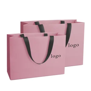 Custom Your Own Logo Shopping Paper Bag for Clothes Pink Matte Clothing Boutique Packaging Bags with Ribbon Handles