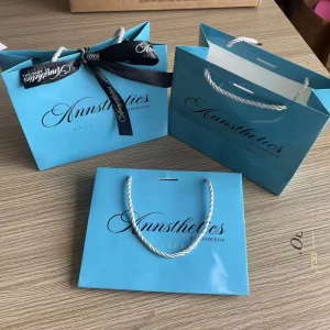 Customized Logo Printed Cardboard Packaging Bags Blue Cardboard Paper Bags With Handle Black Paper Clothing Packaging Gift