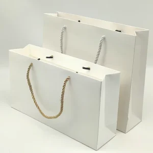 Factory Direct Custom Printed Logo Luxury Cardboard Paper Gift Bag Clothes Packaging Paper Shopping Bag With Handle