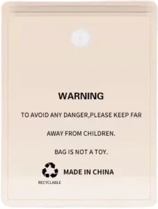 Factory-customized resealable transparent PE garment vacuum packaging bags with zippers and warning lettering