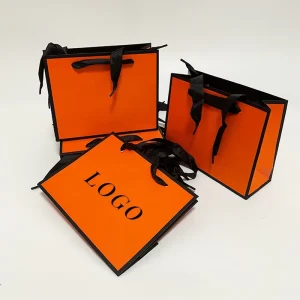 Luxury Art Paper Kraft Paper Bags for Shoes Clothing Jewelry Unique Die Cut Packaging Custom Logo Offset Printing Ribbon Handles