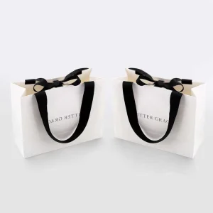 Luxury Kraft Paper Gift Bags Recycled Materials Customizable Size Color Thickness Ribbon Candle Craft
