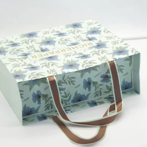 Luxury Kraft Paper Gift Bags Ribbon Handle Customizable Size Color Recycled Materials Offset Printed Logo for Clothing Shoes